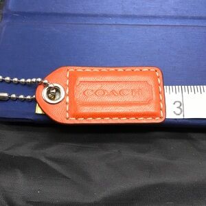 COACH Reddish Orange Leather KEY FOB Bag Charm Keychain HangTag 2.5”L White Back